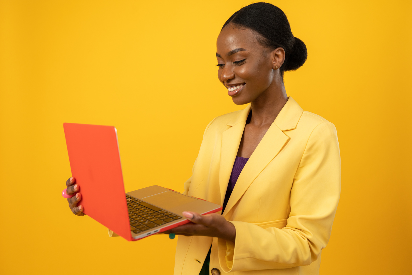 Tech Humans Woman Holding a Laptop